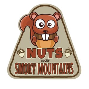 May include: A cartoon graphic featuring a brown squirrel holding an acorn, with the text "NUTS about SMOKY MOUNTAINS" in brown letters. The design is set against a tan background with a brown border and two acorn illustrations.