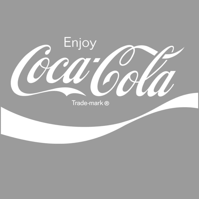 Enjoy Coca-Cola 1970s Script Vinyl Wall Decal is available in Red or White Colored Vinyl, and 4 Sizes.
Shown here in White Vinyl. NOTE: Shown against a gray background so the white image can be viewed.
