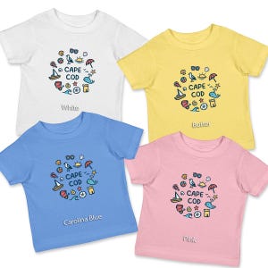 May include: Four toddler t-shirts in different colors: white, yellow, light blue, and pink. Each shirt features a circle design with the text "CAPE COD" and various beach-themed icons.
