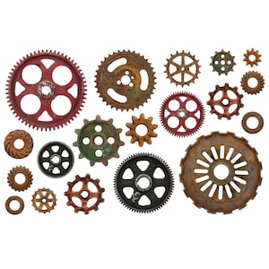 May include: A collection of 17 rusty metal gears of various sizes and shapes, some with red and green accents. The gears are arranged in a random pattern on a white background.
