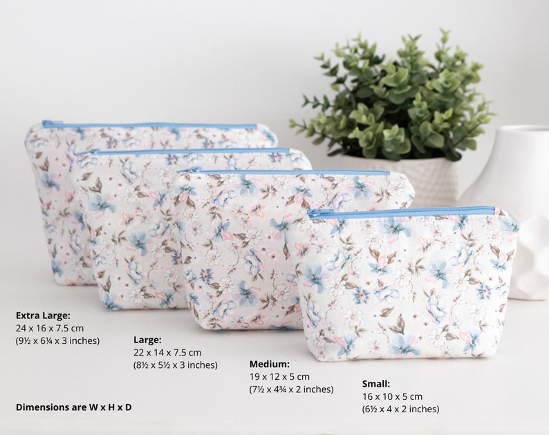 Size guide for the zip pouch sewing pattern showing all four dimensions in centimetres and inches, width by height by depth.