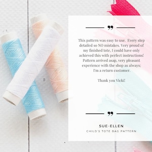 May include: A close-up of sewing supplies, including spools of thread in light blue, white, and peach colors, along with a pink and teal zipper. Text on a white background reads: "This pattern was easy to use...Thank you Vicki!" and "SUE-ELLEN CHILD'S TOTE BAG PATTERN."