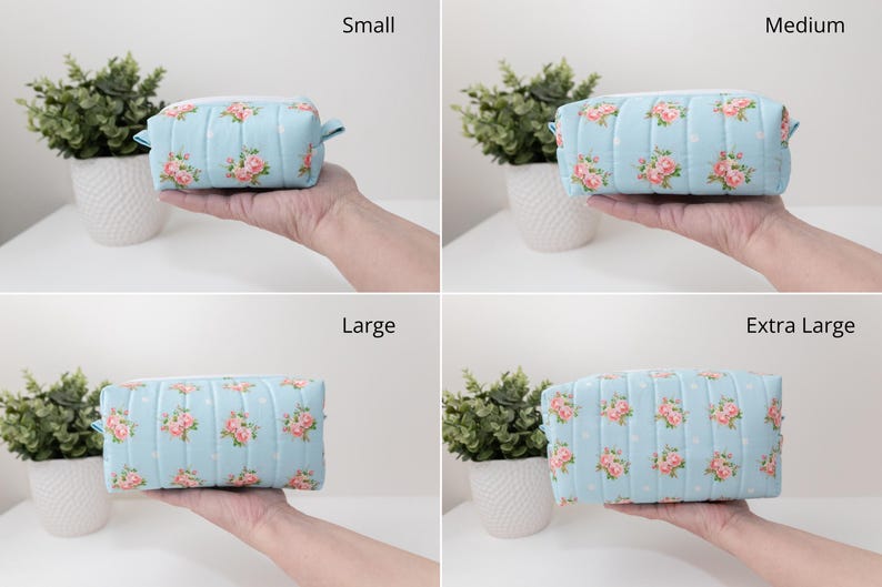 May include: A light blue quilted pouch featuring a repeating pattern of pink roses and white polka dots, shown in four sizes labeled Small, Medium, Large, and Extra Large. The rectangular pouch has a zippered top and a soft, padded fabric texture.