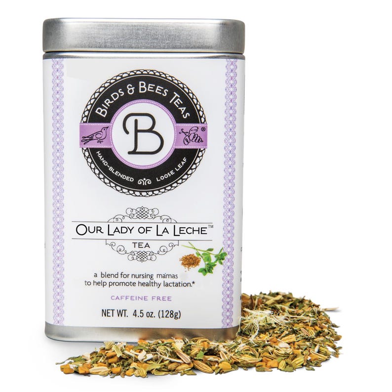 May include: A rectangular tin of "Our Lady of La Leche" tea, with a silver lid and a white label featuring the brand name "Birds & Bees Teas." The label includes text and illustrations, and the net weight is 4.5 oz (128g). Loose tea leaves are scattered in front.