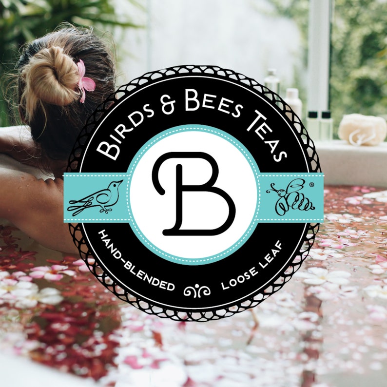 May include: A black and white logo for Birds & Bees Teas. The logo features a stylized letter B with a bird and a bee on either side. The text "Hand-Blended Loose Leaf" is written around the logo.
