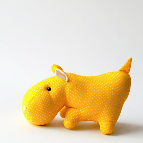 Yellow toy hippo. Stuffed animal. Fabric hippo.