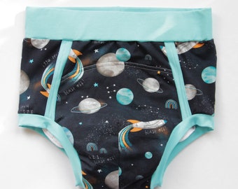 Diaper ABDL with a high fit. Space training pants by an adult boy. Adult baby boy clothing.