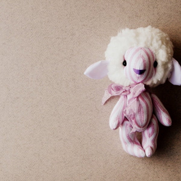 Pink Striped Sheep. Little children's toy. Stuffed animal.