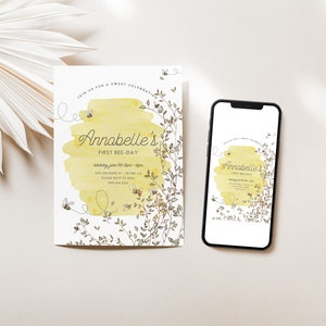 May include: A yellow and white bee-themed first birthday party invitation with a watercolor background and a floral border. The invitation says "Annabelle's First Bee-Day".