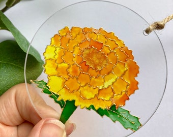 Pintura de vidrio con flor de caléndula de octubre: regalo atrapasol otoñal