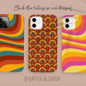 May include: Three different phone cases with retro-inspired designs. The cases feature a wavy pattern in shades of orange, yellow, red, and green. The text "Check other listings for more designs!" is at the top of the image. The text "@JUPITER ALCHEMY" is at the bottom of the image.