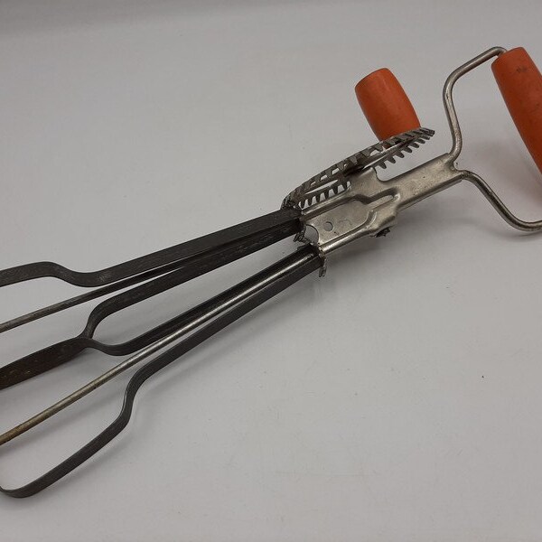 Vintage eggs whisk ,egg beater kitchen utensil , orange wooden handle , made in Belgium