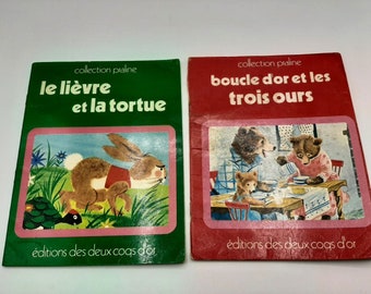 1970  french   children  book,  ,"Goldilocks and the Three Bears/ Les 3 ours", "the hare and the tortoise/le lievre et la tortue"