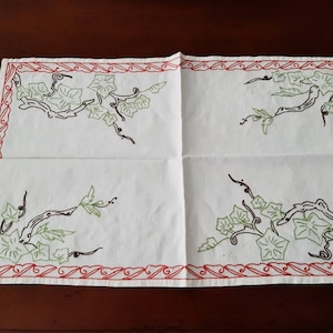 French antique white linen doily, hand embroidered red and green floral decor,