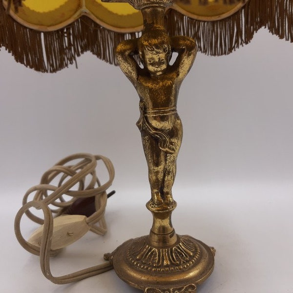 French vintage cherub  brass boudoir lamp, yellow lamp shade , cherub  brass foot bedside lamp