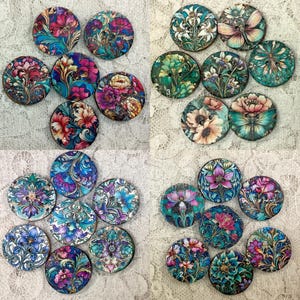 May include: Assortment of 20 round wooden buttons with floral and butterfly designs. The buttons are painted in shades of blue, green, pink, and white.
