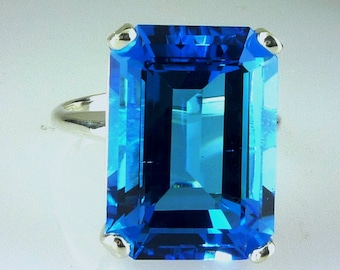 Anillo solitario de topacio azul suizo natural de talla esmeralda grande, plata de ley 925, hecho a mano, 13,61 quilates, piedra de nacimiento de diciembre.