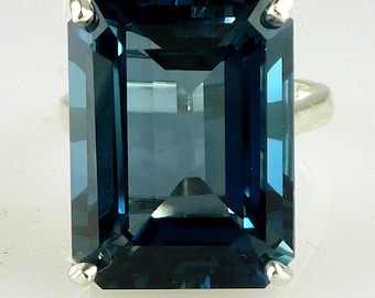 Anillo de topacio azul de Londres natural talla esmeralda extragrande: 29,16 quilates, plata de ley 925, piedra de nacimiento de diciembre, hecho a mano, impecable.