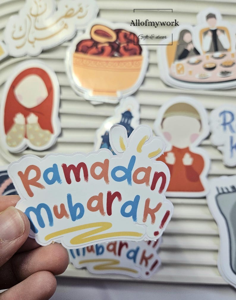 May include: A set of colorful stickers with a Ramadan Mubarak theme. The stickers feature illustrations of a woman in a headscarf, a bowl of dates, a mosque, and a family celebrating Ramadan. The stickers are perfect for adding a festive touch to your home or gifts.
