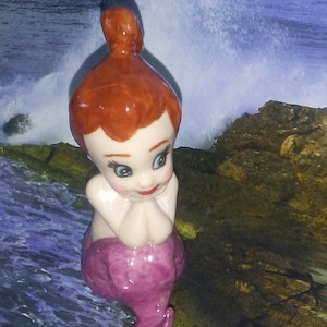 Mermaid Baby Figurine Porcelain with pink fins