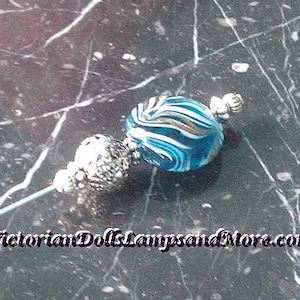 Hat Pin 5 inch with Turquoise glass sparkles bead in silver finish only 10 dollars