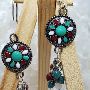 Czech fire polished beads, Opal beads and a tribal charm.