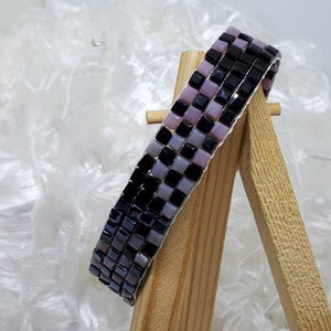 Hand loomed bracelet, gray, black, and lavender-pink, handmade