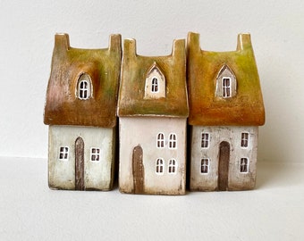 Set of three ceramic box-shaped houses,  can be used as containers for spices or small treasuries/jewelry boxes.