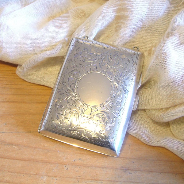 Beautiful ladies silver plate vintage cigarette case with fine detail and hoops for a handle EPNS