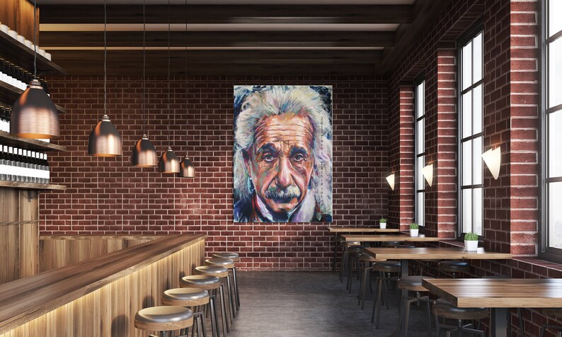 May include: An interior shot of a bar or restaurant with a large portrait of Albert Einstein on a brick wall. The room features wooden tables, stools, and copper-toned pendant lights, creating a warm, inviting atmosphere.