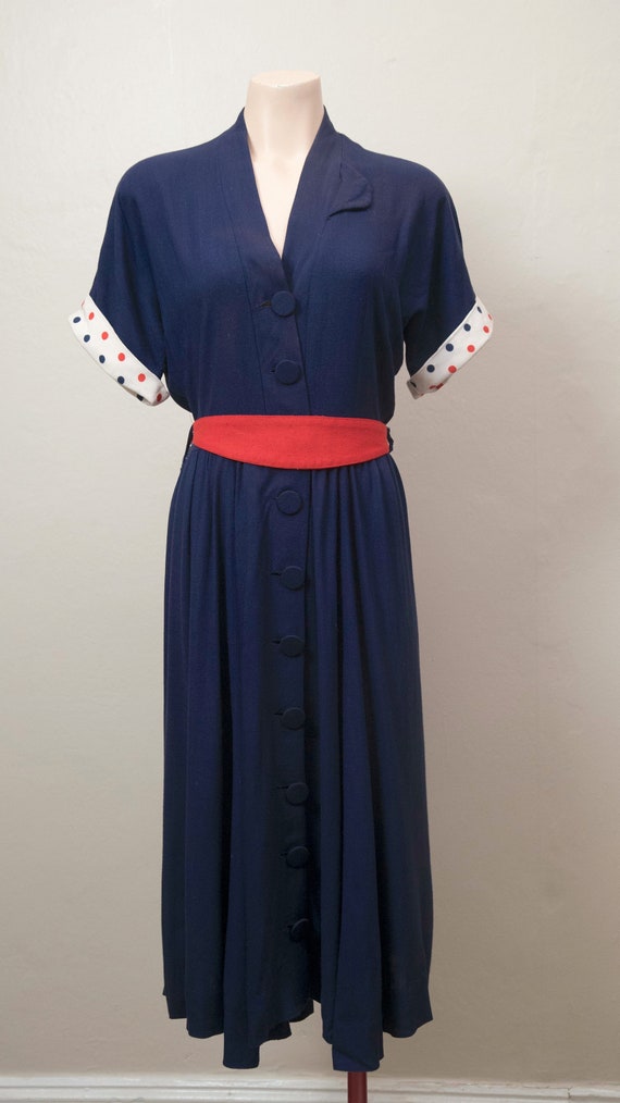 1940s Navy Blue dress with Polka Dot cuffs.