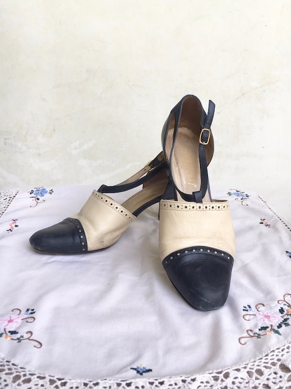 navy and cream heels