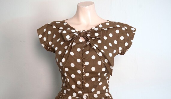 brown and white spotty dress