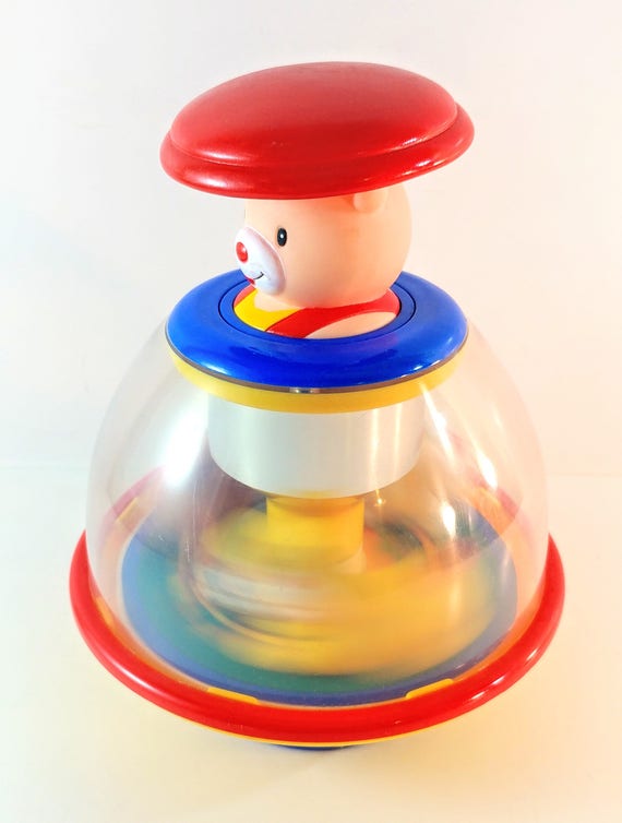 push and spin toy