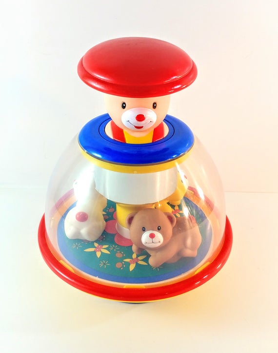 push and spin toy
