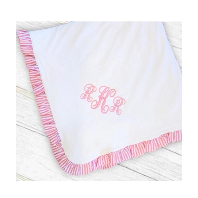 Pink ruffle baby blanket embroidered with monogram