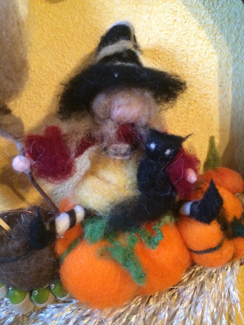 with Witch Halloween natural elements and a bell black cat spider in carded fairy wool Wreath Garland to hang on the door Waldorf