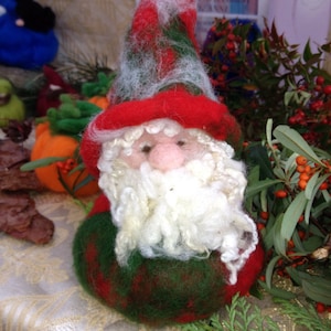 Gnome in carded wool. Waldorf.  Christmas, winter, play, table of kingdom