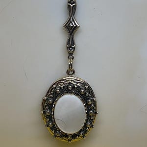 Oval Photo Locket: Mother of Pearl Center, 24&quot; Rolo Chain
