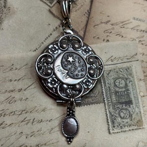 Silver Tone Moon Stars Photo Locket Necklace, Vintage Inspired Celestial Photo Locket on a 24 inch rolo chain.