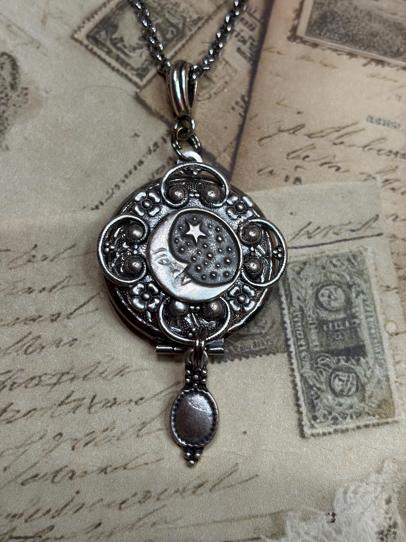 Silver Tone Moon Stars Photo Locket Necklace, Vintage Inspired Celestial Photo Locket on a 24 inch rolo chain.
