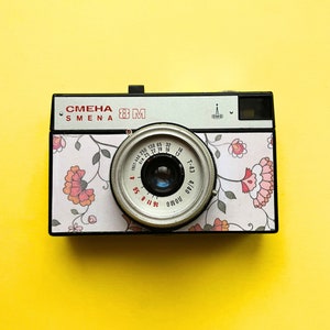 SMENA 8M vintage 35 mm film camera manufactured by Lomo of St. Petersburg including original camera case