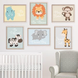 May include: Set of six colorful animal prints with inspirational messages. The prints feature a hippo, lion, monkey, zebra, elephant, and giraffe. The messages include "Be Kind", "Be Brave", "Play Hard", "Be Different", "Dream Big", and "Stand Tall".