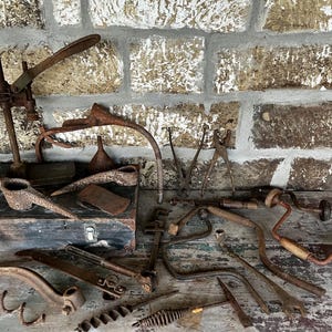 May include: A handmade wooden sign with the text "Welcome" in a playful font. The sign is painted white with a distressed finish, and features a small, decorative heart. Perfect for adding a touch of warmth to any entryway.