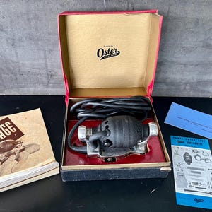 oster handheld vibrating massager Oster® Stim-U-Lax® Massager Demo main image 1