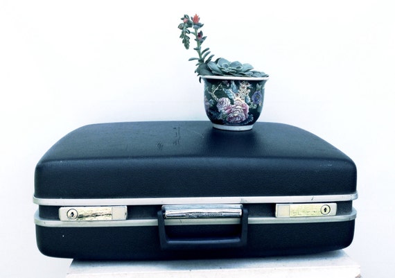 black hard shell suitcase