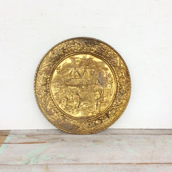 Vintage Round Brass Embossed Tavern Pub Sign "Made in England" Military Soldier Sail Boat & Ocean Scene, 14" Inch Diameter