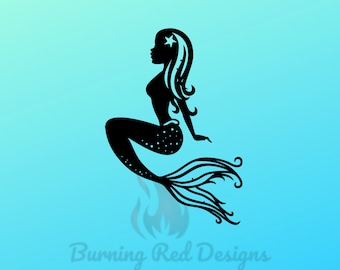 May include: Black silhouette of a mermaid with a star on her head and a flowing tail. The mermaid is sitting with her tail curled behind her.