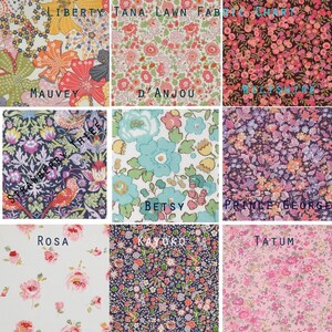 May include: A fabric chart featuring nine different floral patterns. The fabrics include designs with large flowers in orange, pink, and yellow, as well as smaller floral prints in various colors. Each fabric swatch is labeled with a name.