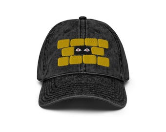 Cappello nero sbiadito con ricamo giallo Eyes In The Wall
